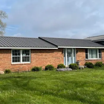 Brick house with metal roof