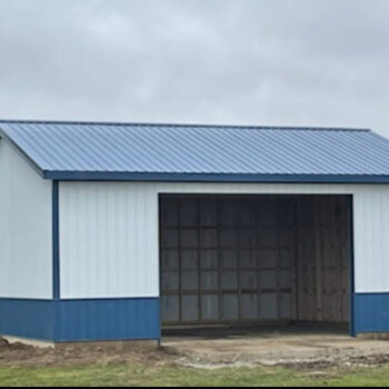 Metal shed with blue roof