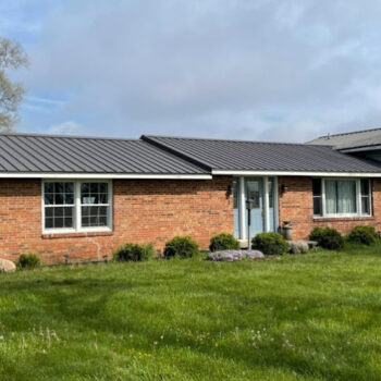 Brick house with metal roof